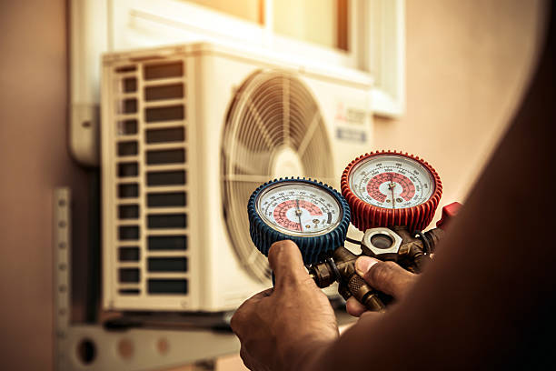 Professional Ductwork Repair technician working in Mountainburg, AR